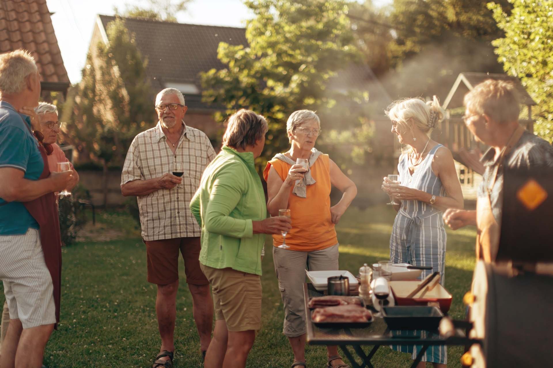 A group of seniors enjoying a bbq